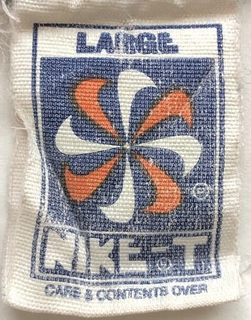 Vintage Nike pinwheel neck tag, blue and orange swooshes arranged in a circular pinwheel above the NIKE-T wordmark, size LARGE
